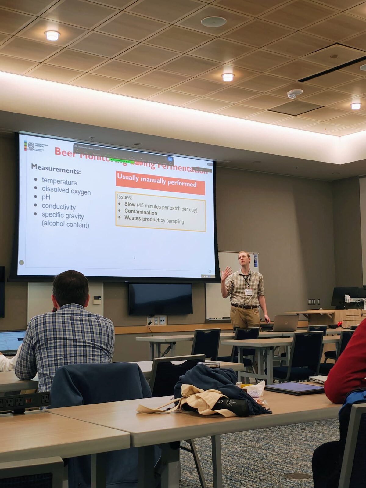 Bentley Oakes presenting beside a slide about beer fermentation monitoring and manual sampling at EDTconf 2025.